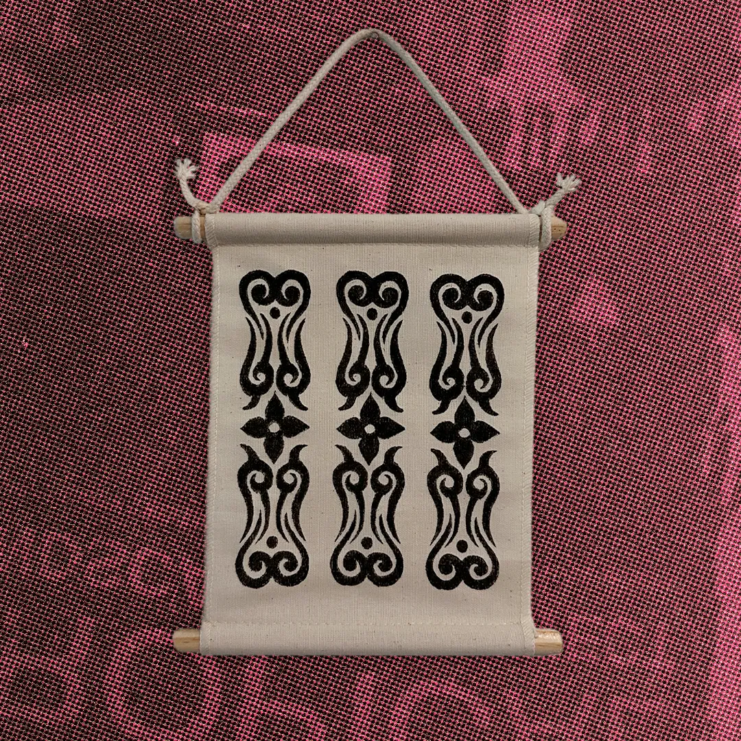 Canvas wall banner printed with a black floral pattern