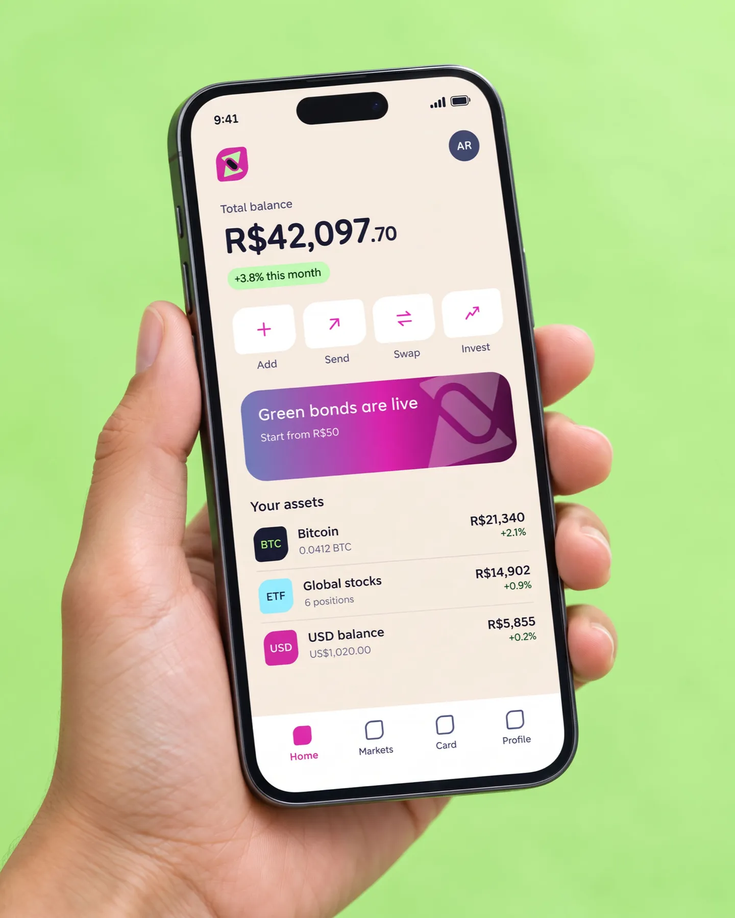 The app on a phone held in a hand
